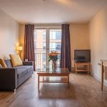 Large-sitting-room-with-space-to-work-eat-and-relax-at-PREMIER-SUITES-Birmingham