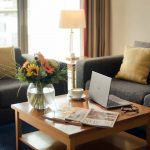 PREMIER-SUITES-Dublin-Sandyford-sofas-and-table-with-laptop